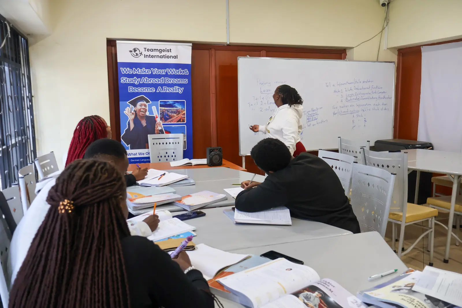 A German class in session at Teamgeist International in Nairobi, with the instructor at the whiteboard